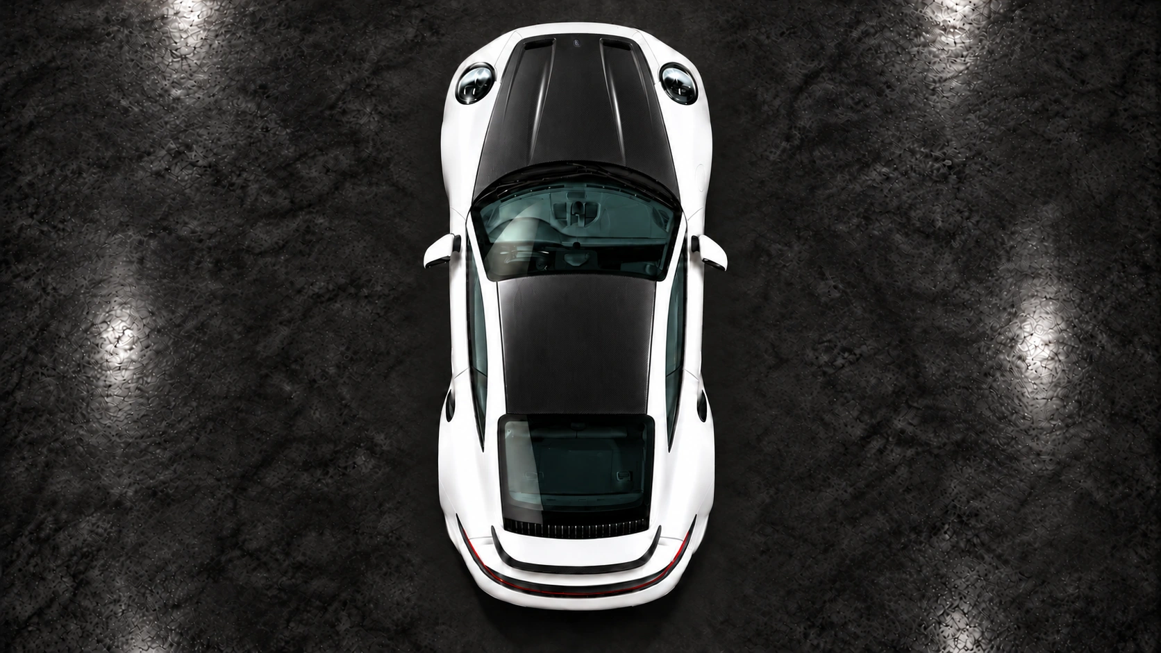 Pearl-white Porsche 911 Turbo S 992.2 with TECHART carbon aero and black Formula IX wheels: Direct overhead