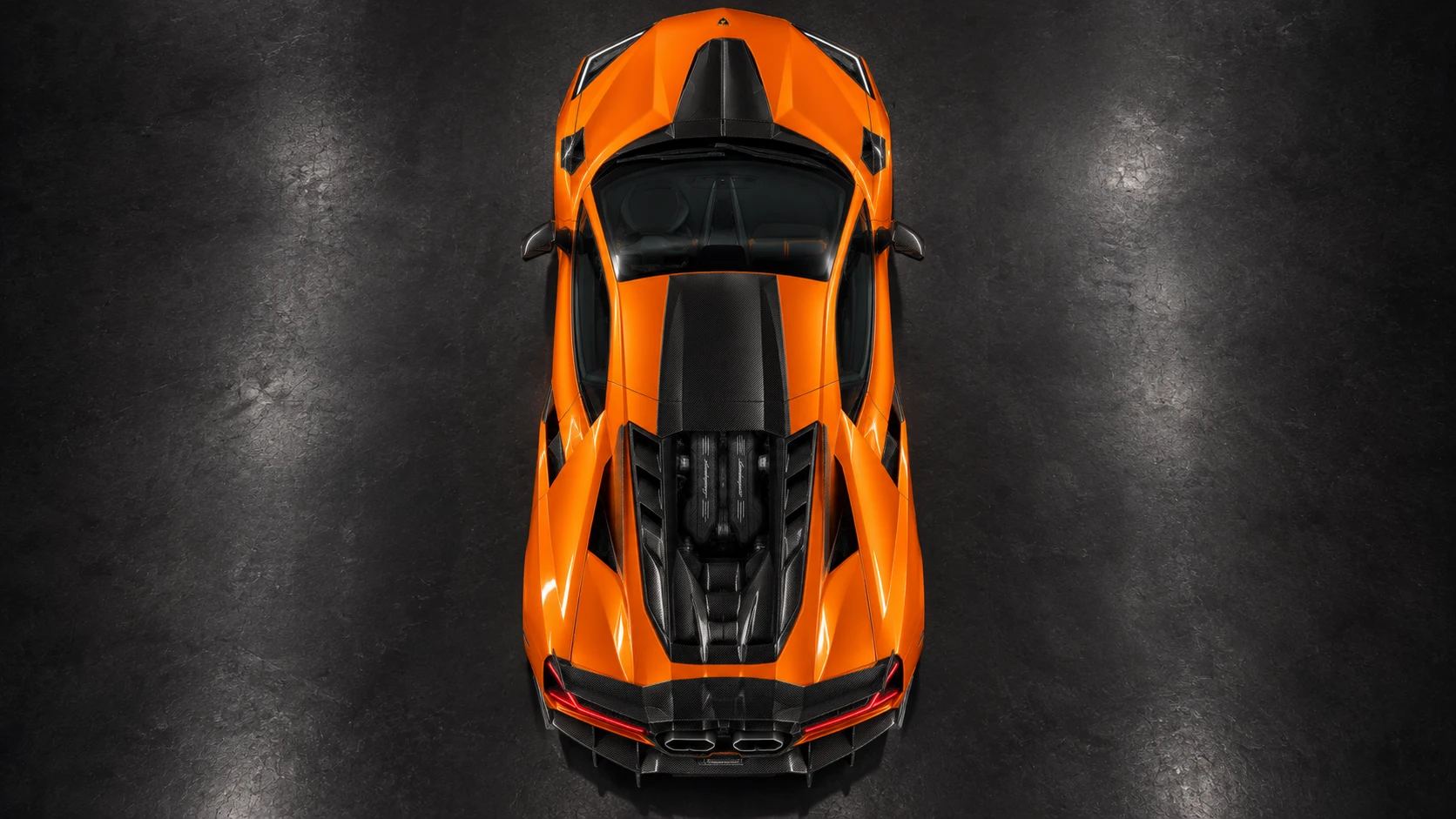 Orange Lamborghini Revuelto with NOVITEC carbon aero and Valvetronic exhaust: Direct overhead